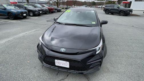 Midnight Black Metallic 2024 Toyota Corolla Hybrid SE