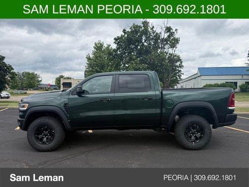 Serrano Green Metallic 2026 RAM 1500 RHO Crew Cab 4x4 5'7' Box