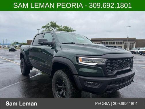 Serrano Green Metallic 2026 RAM 1500 RHO Crew Cab 4x4 5'7' Box