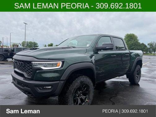 Serrano Green Metallic 2026 RAM 1500 RHO Crew Cab 4x4 5'7' Box