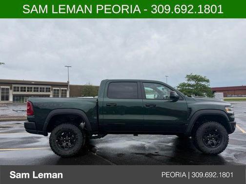 Serrano Green Metallic 2026 RAM 1500 RHO Crew Cab 4x4 5'7' Box