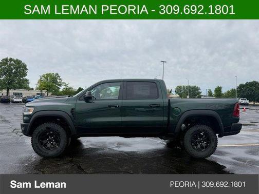 Serrano Green Metallic 2026 RAM 1500 RHO Crew Cab 4x4 5'7' Box