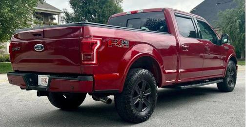 Red 2015 Ford F-150 Lariat