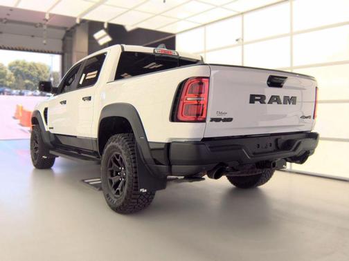 Bright White Clearcoat 2025 RAM 1500 RHO Crew Cab 4x4 5'7' Box