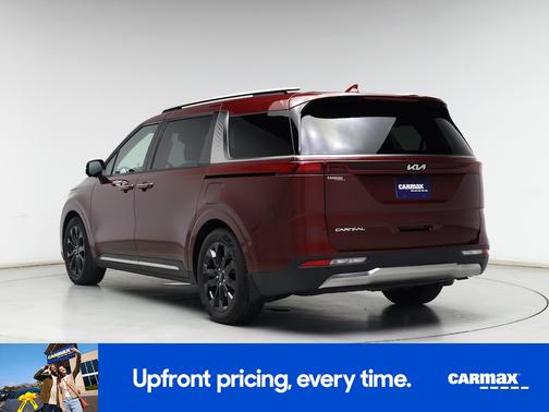 Burgundy 2024 Kia Carnival SX Prestige