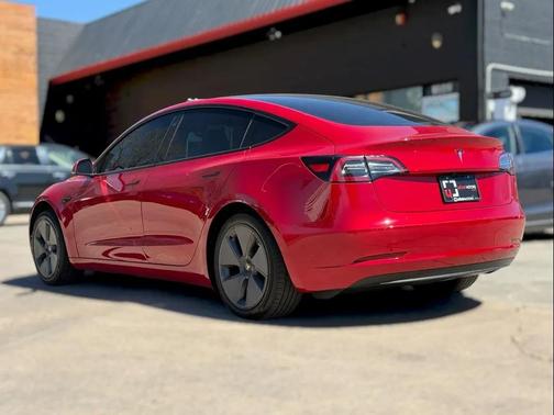 Red 2023 Tesla Model 3 Standard Range