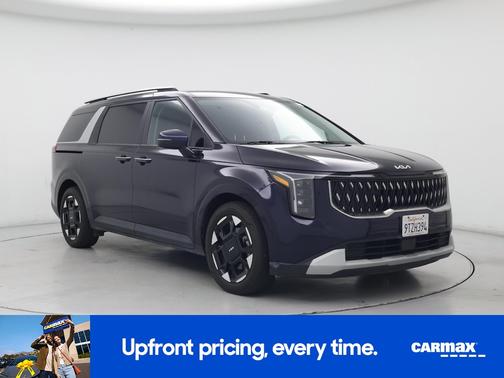 Blue 2025 Kia Carnival EX