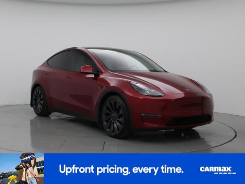 Red 2025 Tesla Model Y Performance