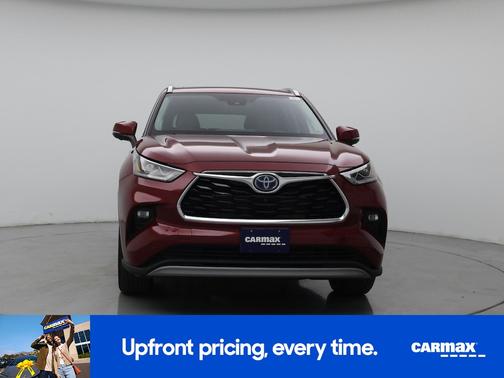 Red 2023 Toyota Highlander Hybrid Platinum