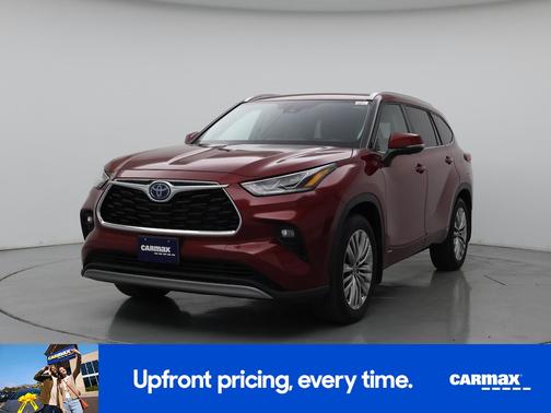 Red 2023 Toyota Highlander Hybrid Platinum