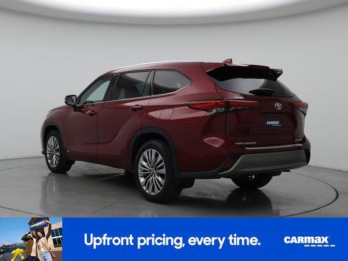 Red 2023 Toyota Highlander Hybrid Platinum