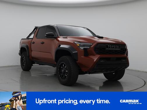 Orange 2024 Toyota Tacoma Hybrid TRD Pro