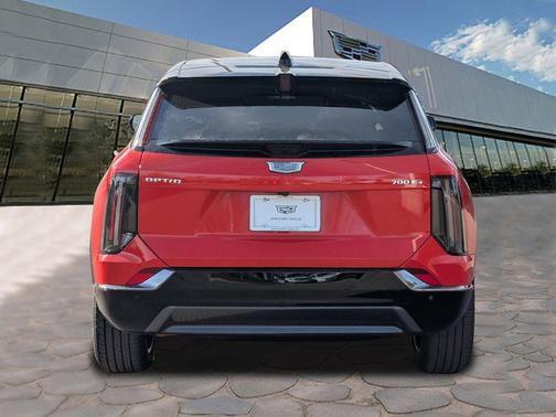 Orange 2026 Cadillac OPTIQ Sport