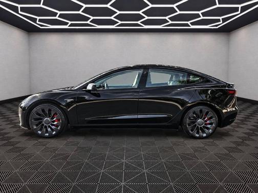 Solid Black 2023 Tesla Model 3 Performance