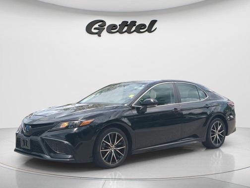 Midnight Black Metallic 2023 Toyota Camry Hybrid SE