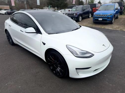 Pearl White Multi-Coat 2023 Tesla Model 3 Performance