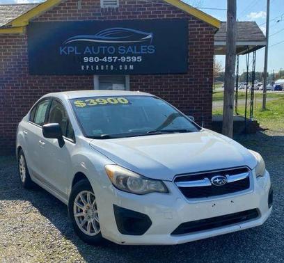 White 2012 Subaru Impreza 2.0i