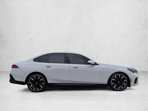 Alpine White 2026 BMW 550e xDrive