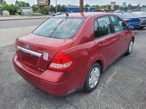 Red Brick 2011 Nissan Versa 1.8 S