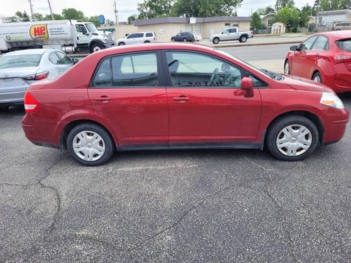 Red Brick 2011 Nissan Versa 1.8 S