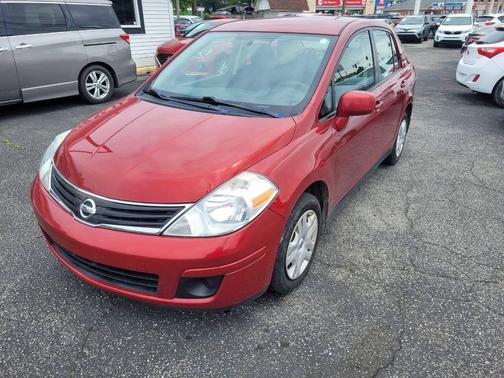 Red Brick 2011 Nissan Versa 1.8 S