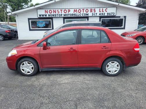 Red Brick 2011 Nissan Versa 1.8 S