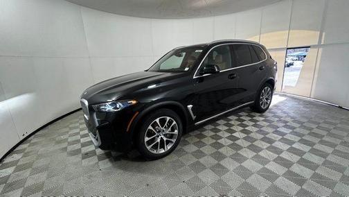 Black Sapphire Metallic 2026 BMW X5 PHEV xDrive50e