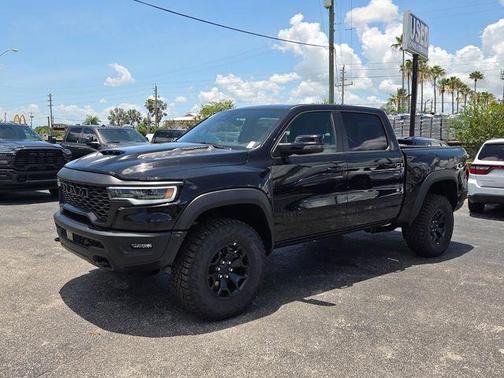 Diamond Black Crystal Pearlcoat 2026 RAM 1500 RHO Crew Cab 4x4 5'7' Box