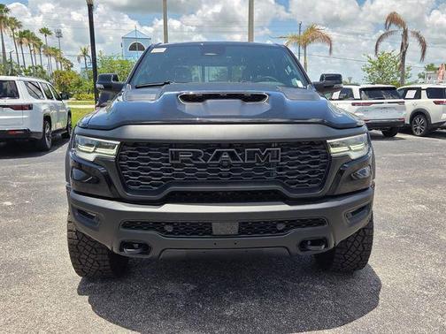 Diamond Black Crystal Pearlcoat 2026 RAM 1500 RHO Crew Cab 4x4 5'7' Box