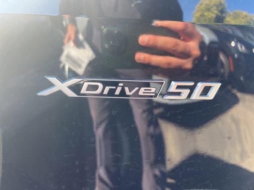 Black Sapphire Metallic 2024 BMW iX xDrive50