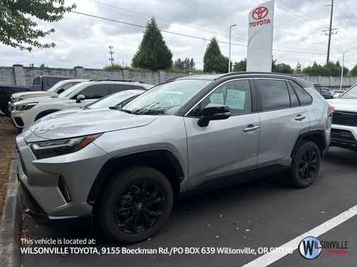 Silver Sky Metallic/Midnight Black Metallic 2023 Toyota RAV4 Hybrid SE