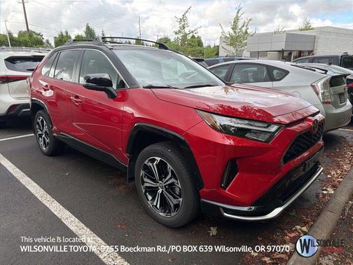 Supersonic Red/Midnight Black Metallic 2025 Toyota RAV4 Hybrid SE