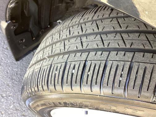 Midnight Black Metallic 2025 Toyota Corolla Hybrid LE