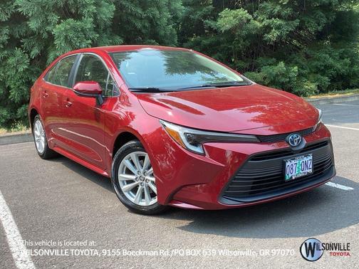 Ruby Flare Pearl 2025 Toyota Corolla Hybrid LE