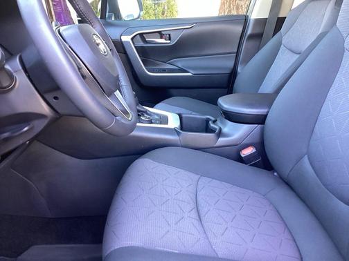Ice Cap/Midnight Black Metallic 2025 Toyota RAV4 Hybrid Woodland Edition
