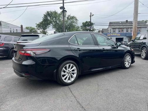 Midnight Black Metallic 2023 Toyota Camry LE Auto (Natl)