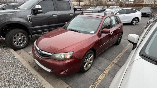 Red 2011 Subaru Impreza Outback Sport Base