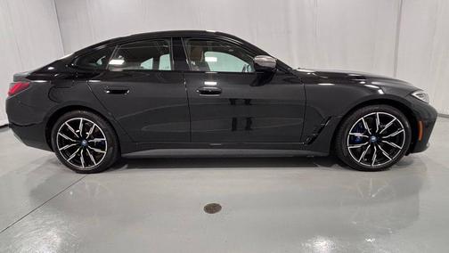 Black Sapphire Metallic 2024 BMW i4 Gran Coupe M50