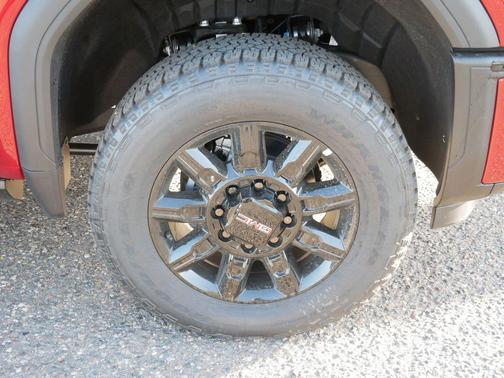 Volcanic Red Tintcoat 2026 GMC Sierra 3500 AT4