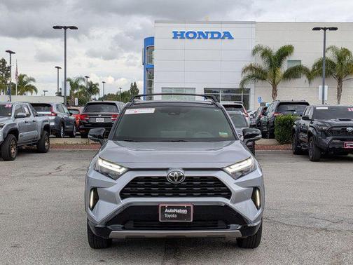 Silver Sky Metallic/Midnight Black Metallic 2025 Toyota RAV4 Hybrid SE