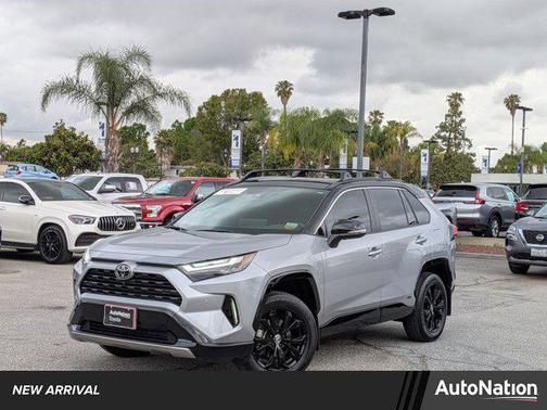 Silver Sky Metallic/Midnight Black Metallic 2025 Toyota RAV4 Hybrid SE