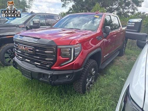 Volcanic Red 2025 GMC Sierra 1500 AT4X