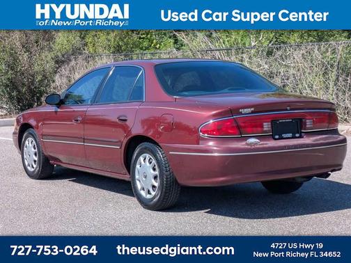Bordeaux Red Pearl 1999 Buick Century Custom