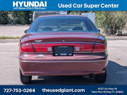 Bordeaux Red Pearl 1999 Buick Century Custom