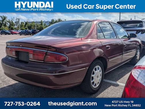 Bordeaux Red Pearl 1999 Buick Century Custom