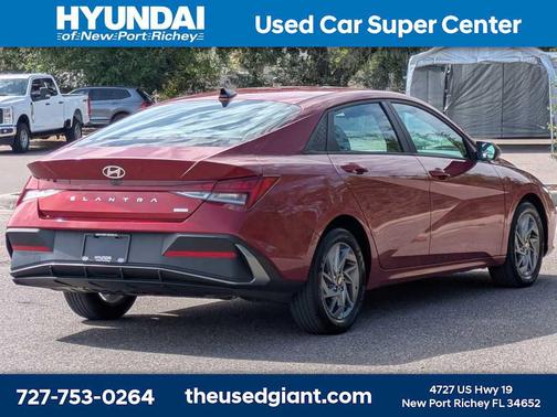 Ultimate Red Metallic 2024 Hyundai ELANTRA HEV Blue