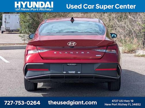 Ultimate Red Metallic 2024 Hyundai ELANTRA HEV Blue