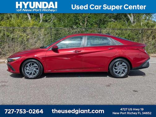 Ultimate Red Metallic 2024 Hyundai ELANTRA HEV Blue