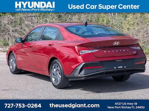 Ultimate Red Metallic 2024 Hyundai ELANTRA HEV Blue