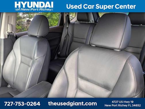 Caspian Blue Metallic/Super Black 2023 Nissan Rogue SL